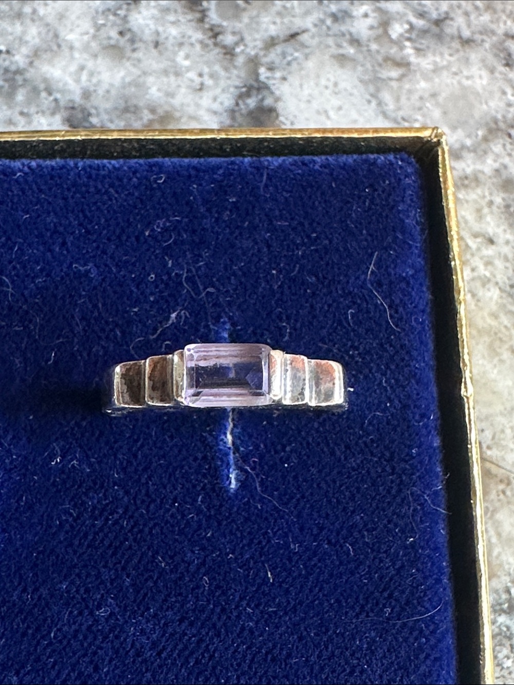 Source Unknown vintage Silver Ring with amethyst emerald cut stone.